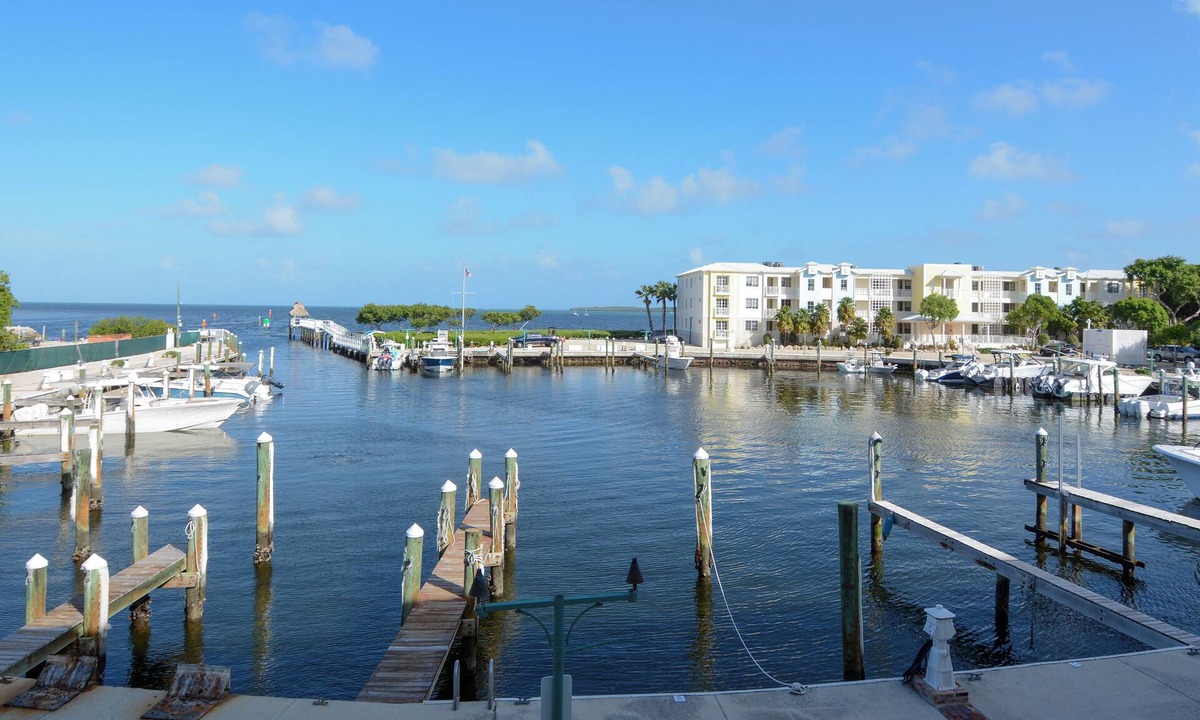 Rock Harbor Condo | 122 Mariners Club - An exceptional 2 bedroom luxury condo with ocean and marina views