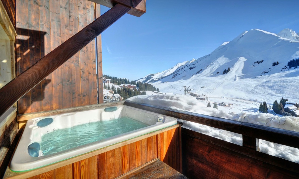 Manigod Ski Chalet | Chalet Capieu - ski-in ski-out base for 13, hot tub & views - OVO Network