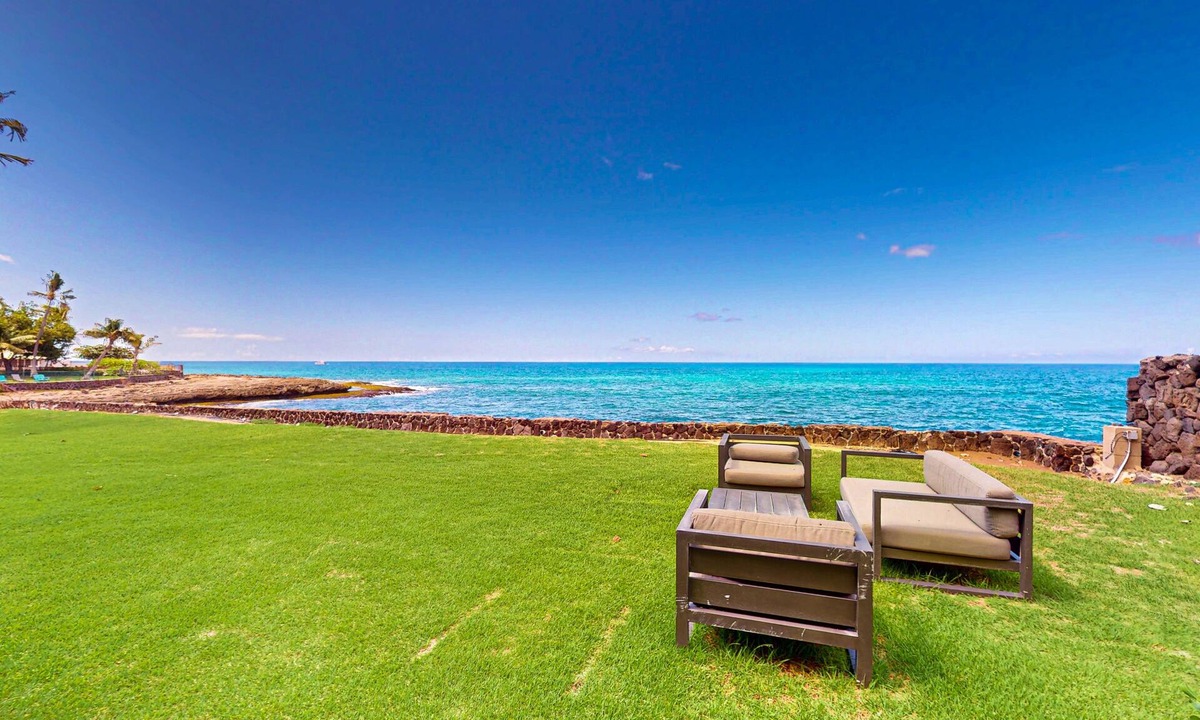 Makaha House | Oceanfront home with wrap around lanai, private sauna, beach access & WIFI