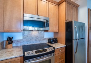 Updated Designer Condo w/Ocean Views within five minutes to the beach