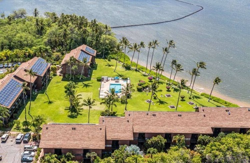 Kaunakakai Condo | Enjoy laid-back Molokai living in this vacation home with a private lanai leading onto the resort’s