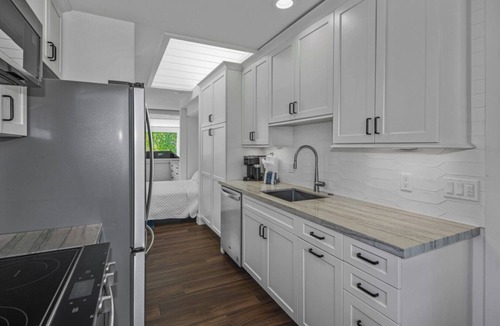 Historic Kailua Village Villa | Enjoy staying right on Keiki beach. Walking distance to the Ironman start!