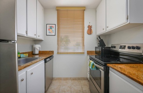Historic Kailua Village Condo | Experience oceanfront luxury at Hale Kona Kai 301, a perfect getaway.