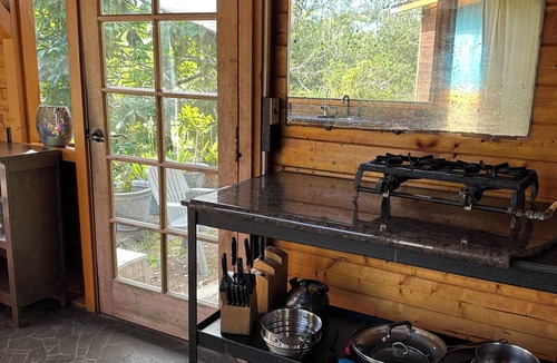 Orchidlands Estates Cabin | Glam camping in a private artistic solar eco-cabin