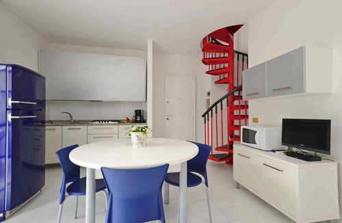 Lignano Pineta Apartment | Holiday apartment with air conditioning, balcony and pool