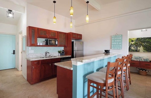 Wailua Condo | Ocean View 3 Bed Suite - Sleeps 6 with Pool & A/C - Steps to the Sand in Kapaa!