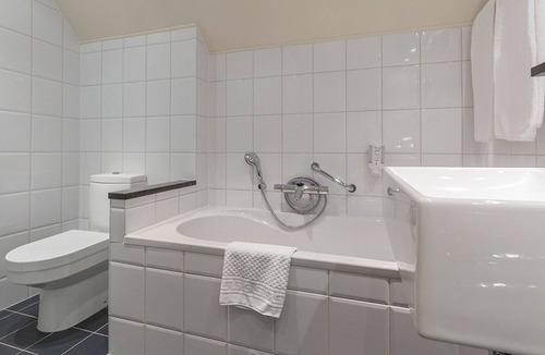 Kerkrade Hotel | Unwind in Historic Farmhouse Room Near Maastricht City Center