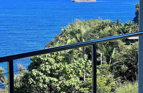Papaikou House | Watch whales from your private lanai in this beautiful luxury ocean view home
