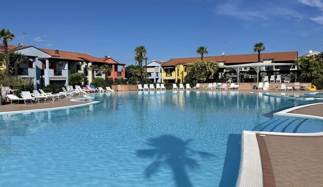 Charming apartment with private garden and swimming pool in Aprilia Marittima in Aprilia Marittima