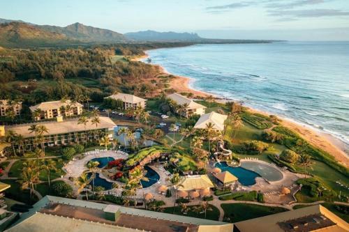 Exclusive Kauai Beachfront Resort with Dining, Bar, Spa, Pool & Waterslide