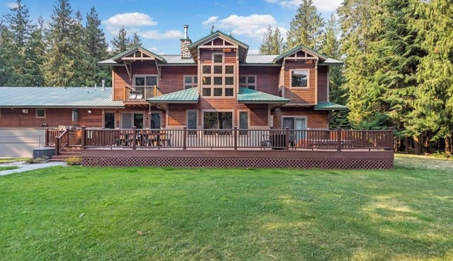 Expansive Riverfront Lodge with Dock, Game Room, Bar & Spacious Deck! in Clark Fork