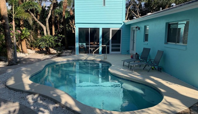 LOWERED FALL RATES! 5 star 5 bed home + pool + tropic setting + 1 block to beach in Vero Beach
