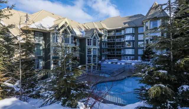 Slopeside Ski In/Out, corner unit, forest view | Pool & Hot Tub, great for families | Calling in NA in Whistler