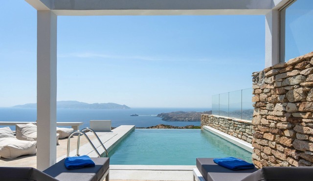 Stemma is a charming stone villa nestled on a hillside above Mylopotas in Ios