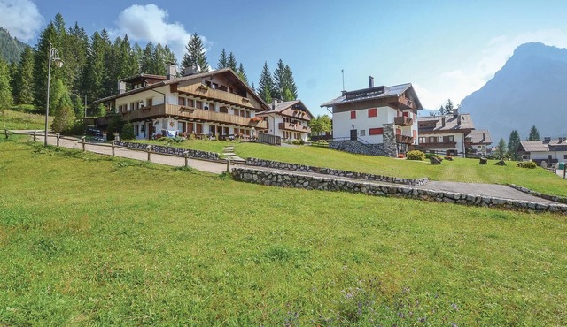 This practically furnished vacation apartment is part of a residence at the entrance to the ancient in Sappada UD
