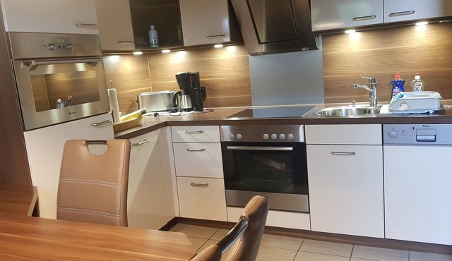 Vacation home bungalow, one floor, fenced garden, dog allowed, 2 parking spaces in Butjadingen
