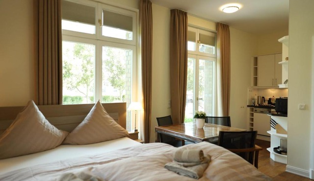 Villa Schmidt Apartments - Strandhaus direkt am Meer mit Sauna, Sport und Dünengarten - Komfort in Warnemünde