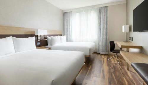 Queen Room with Two Queen Beds and City View - Hearing Accessible